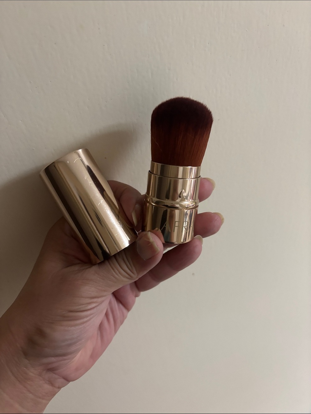 JAFRA Gold Retractable Kabuki Brush with Brown Bristles